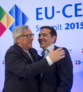 European Commission President Jean-Claude Juncker welcomes Greece's Prime Minister Alexis Tsipras at the start of an EU-CELAC Latin America summit in Brussels